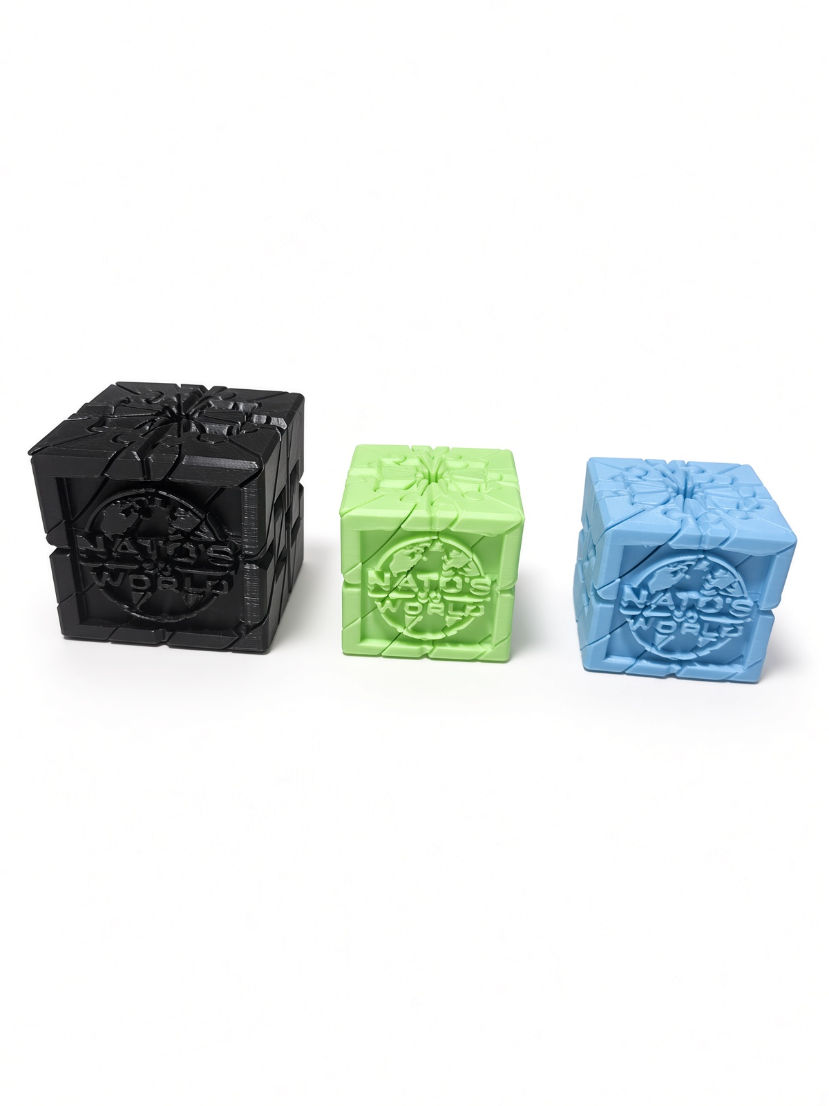 THE CUBE in black, glow green, and blue